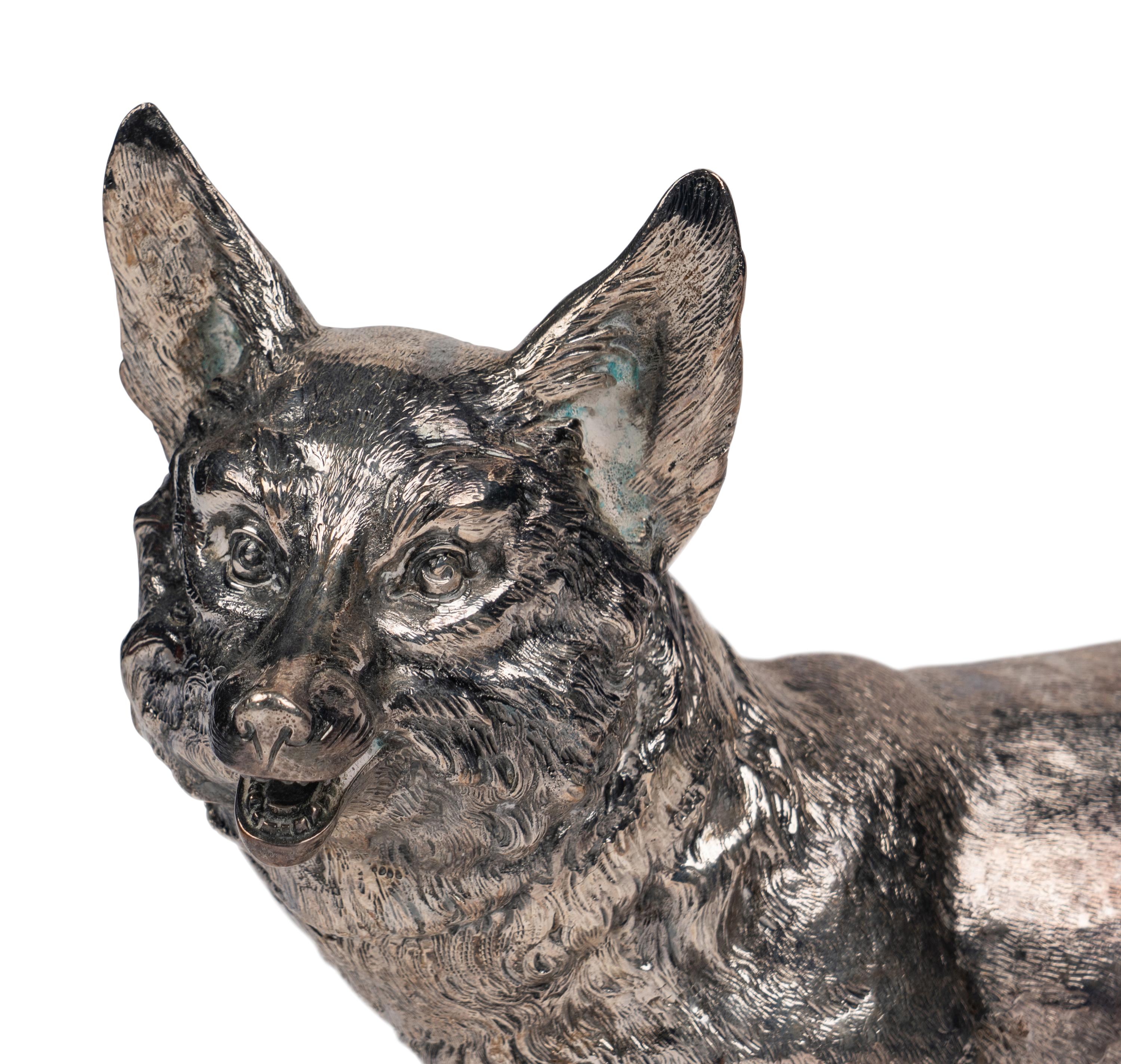 A Pair of Silver Fox-Form Table Ornaments