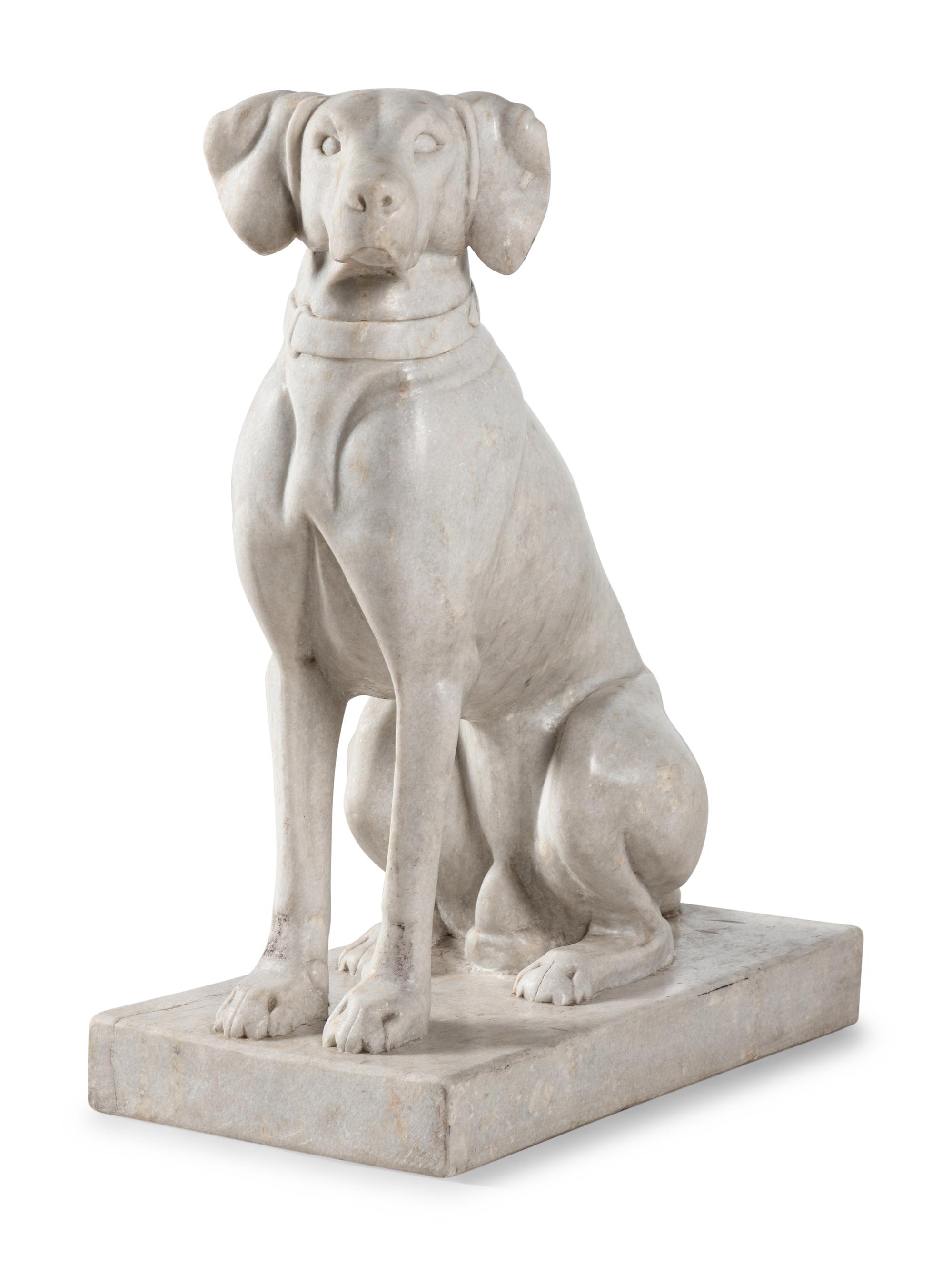 A Composition Marble Seated Dog