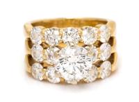 An 18 Karat Yellow Gold and Diamond Ring Set, Hearts on Fire, 15.90 dwts.