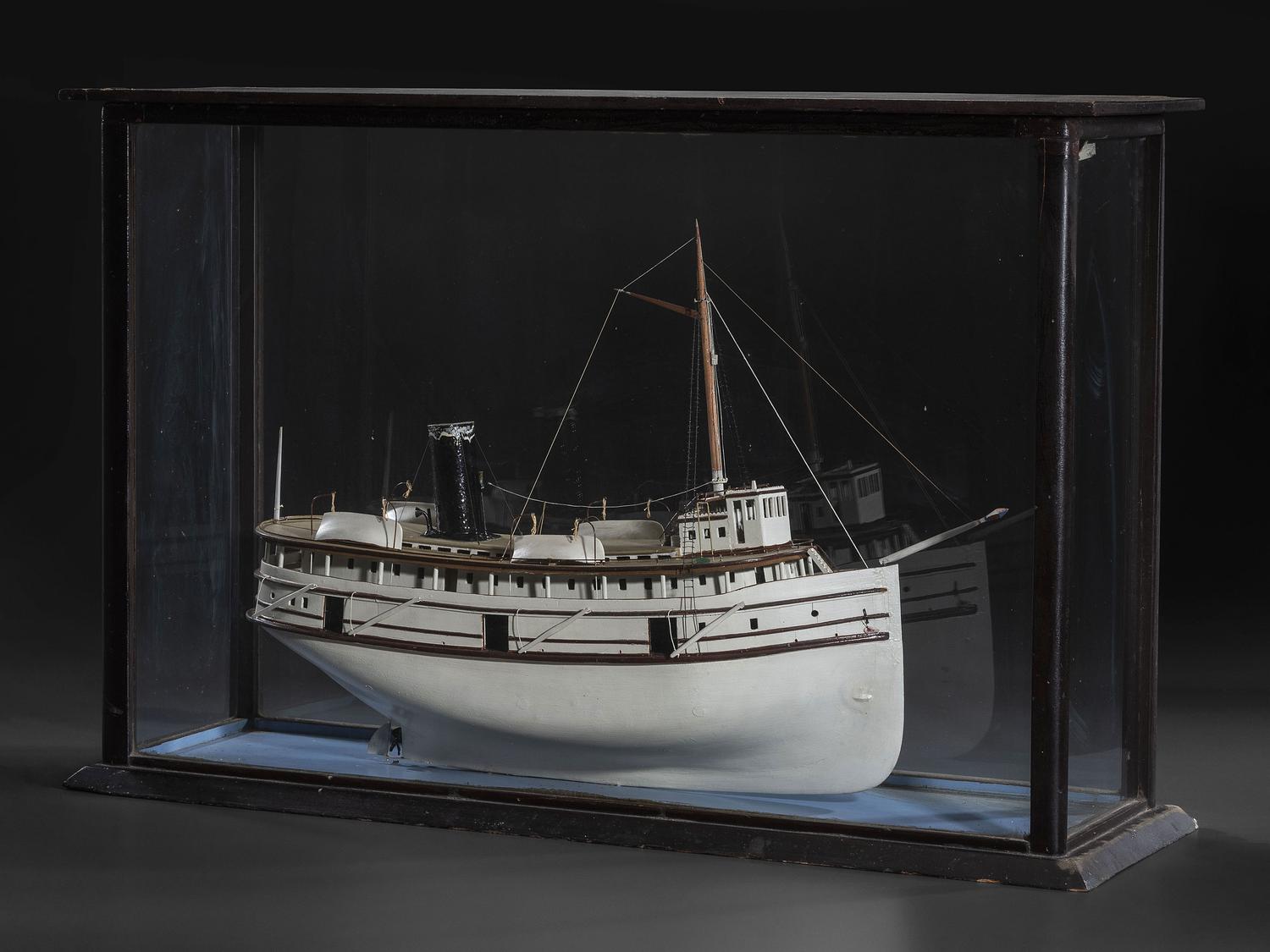 A Painted Wood Cased Steamboat Model