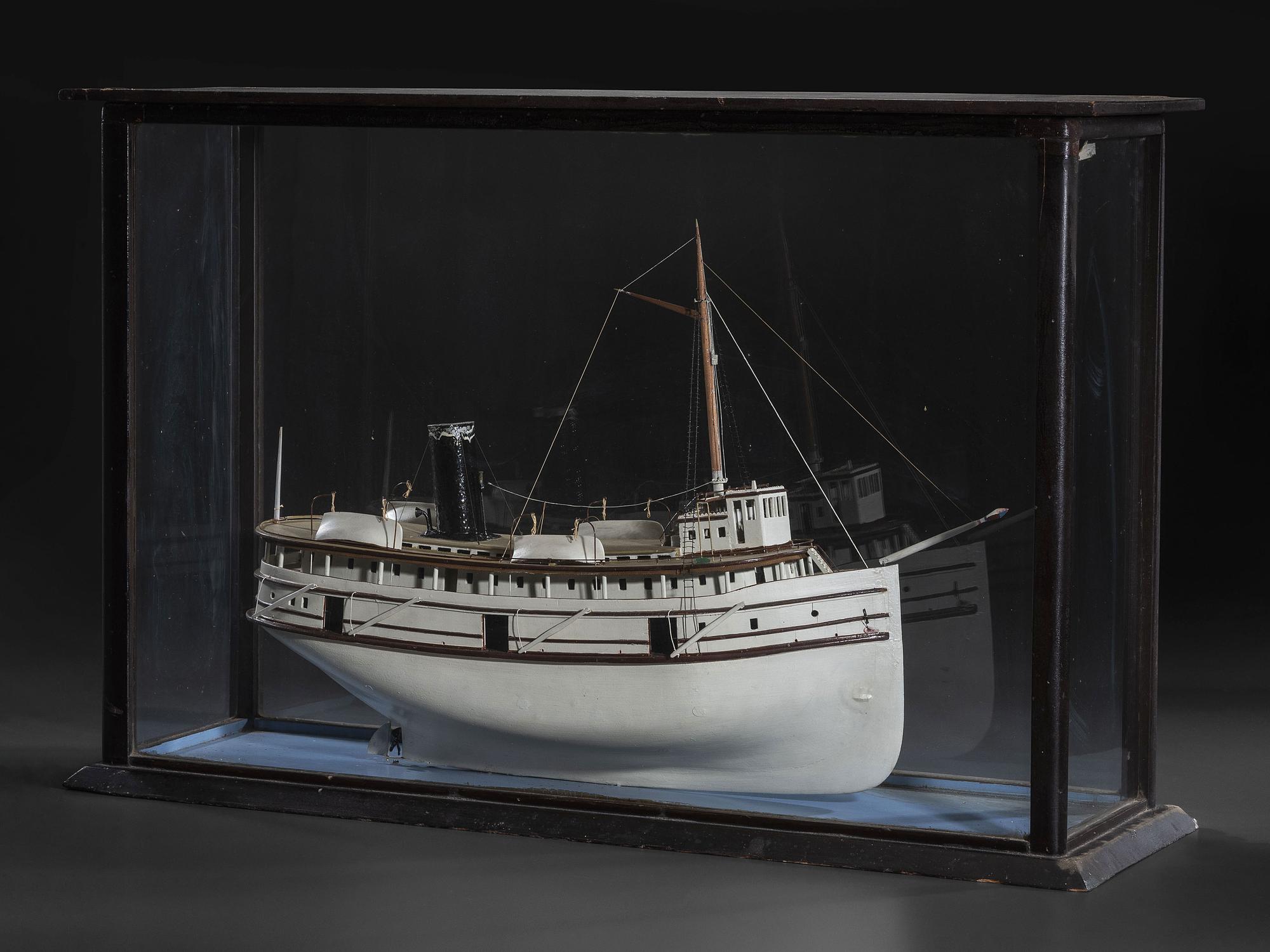 A Painted Wood Cased Steamboat Model