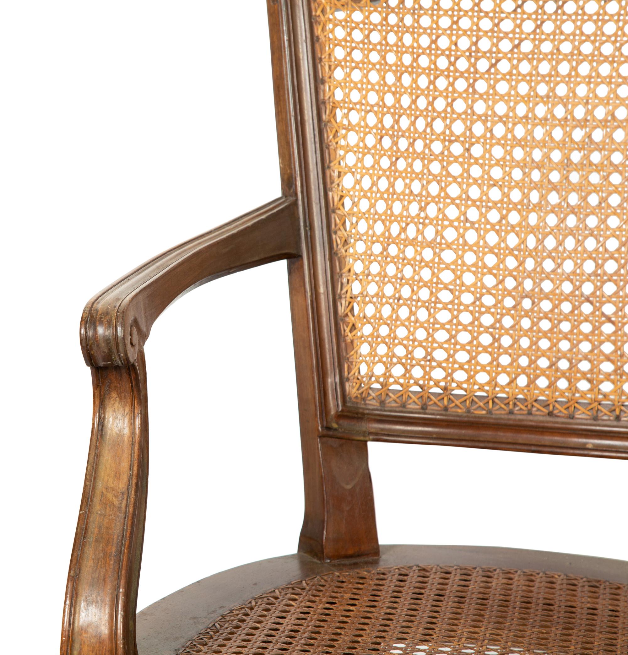 A Pair of Italian Caned Armchairs