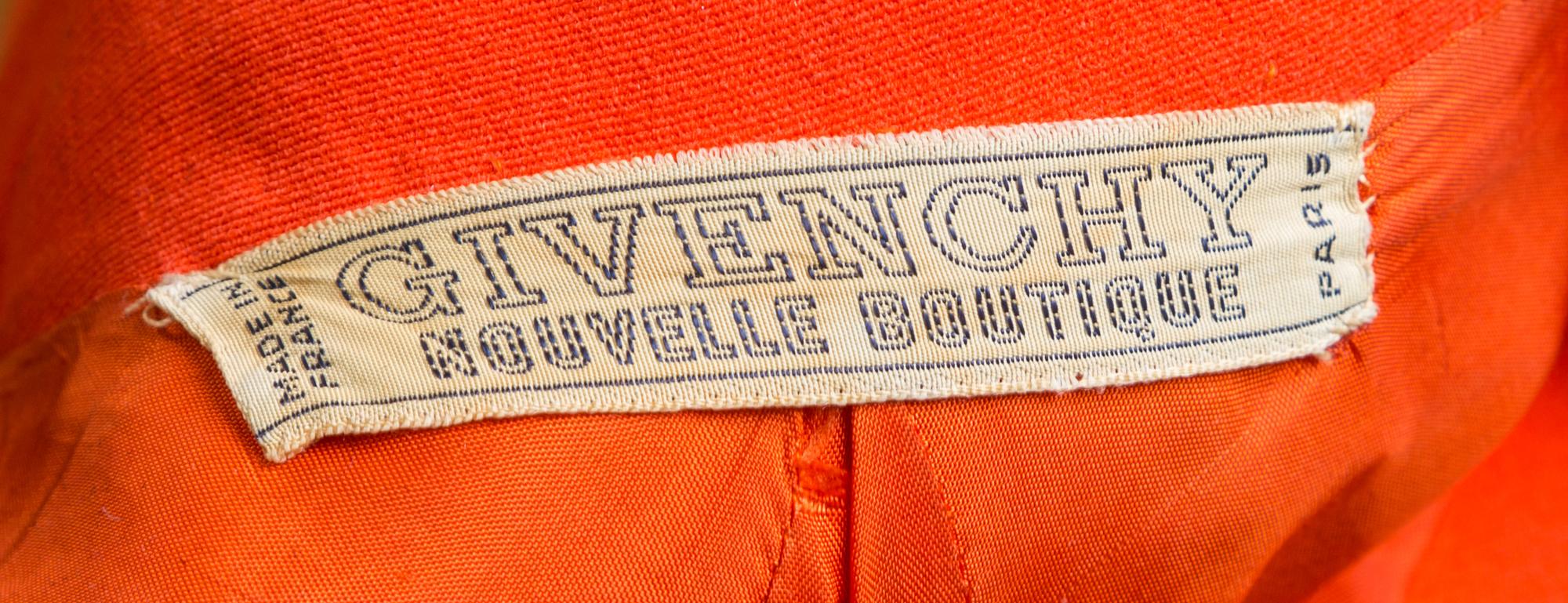 A Givenchy 1970s Orange Techno Coat, No size.