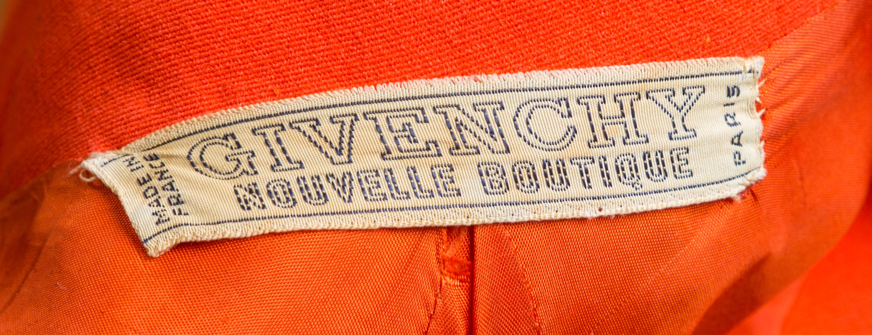 A Givenchy 1970s Orange Techno Coat, No size.