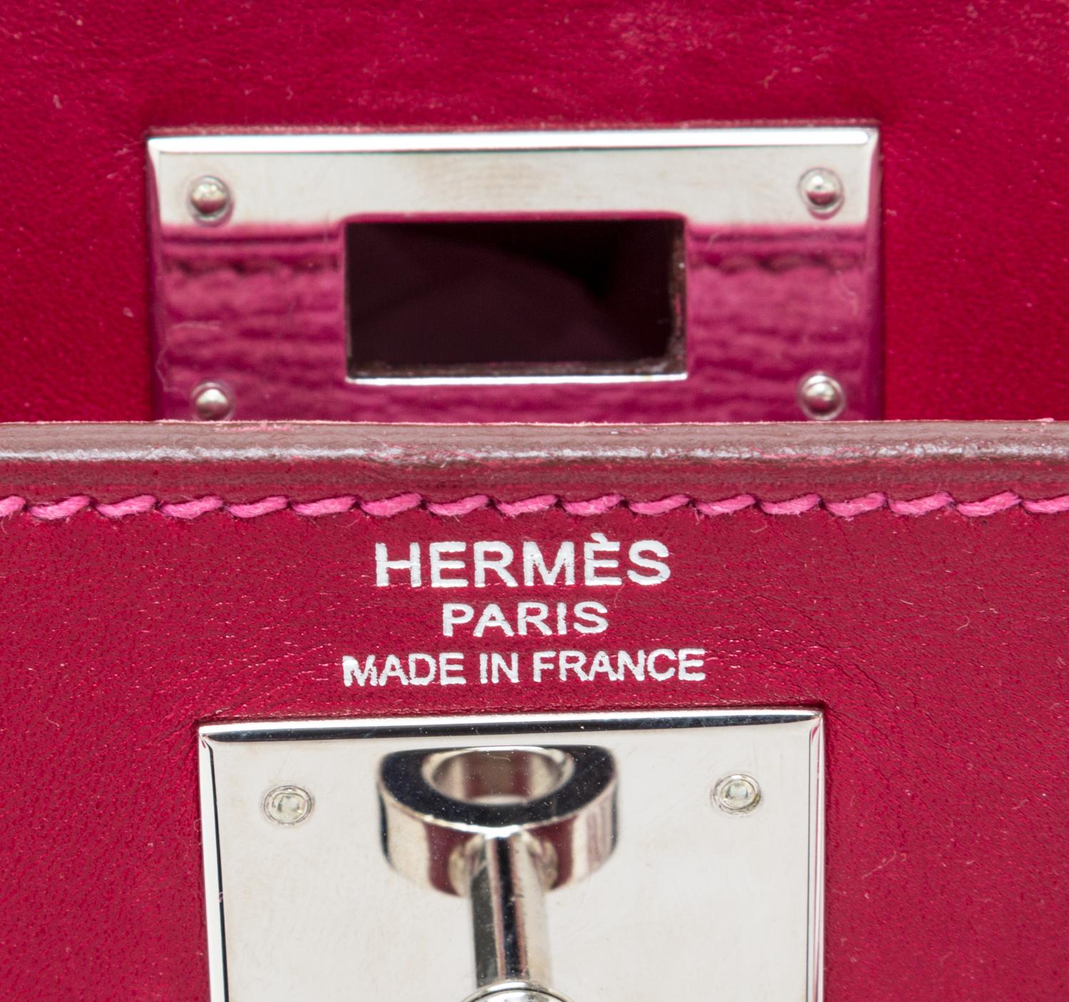 An Hermes Rubis and Rose Tyrien Candy Tadelakt and Chevre Retorne 28cm Kelly Handbag, 11" x 8.5" x 4".