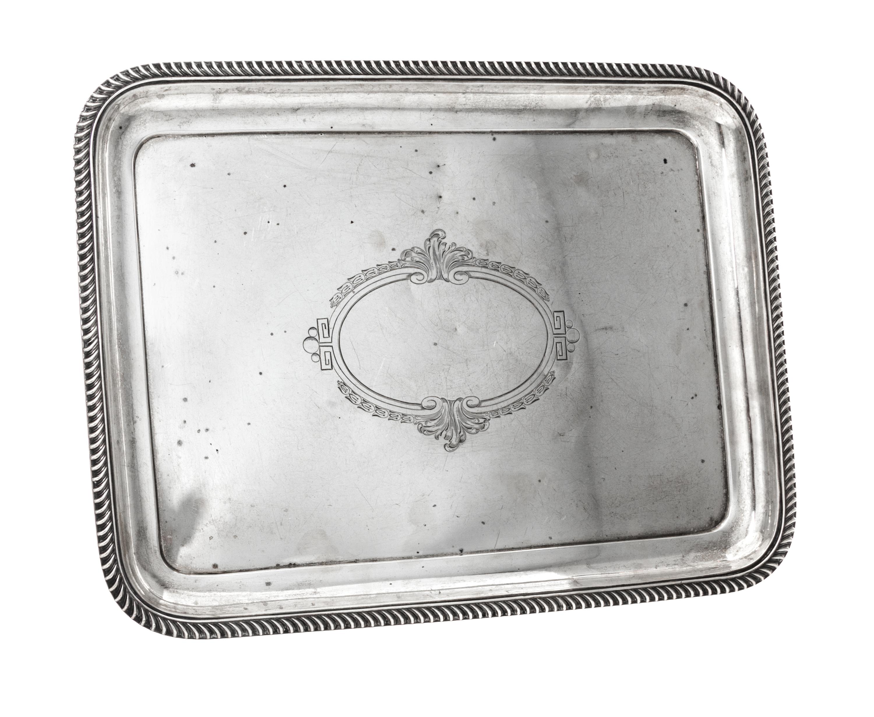 An Italian Silver Dish, , centered by a foliate and bellflower decorated cartouche.