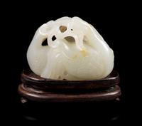 A White and Russet Jade Carving Length of jade 2 1/8 x width 1 1/2 inches. — 18TH/19TH CENTURY