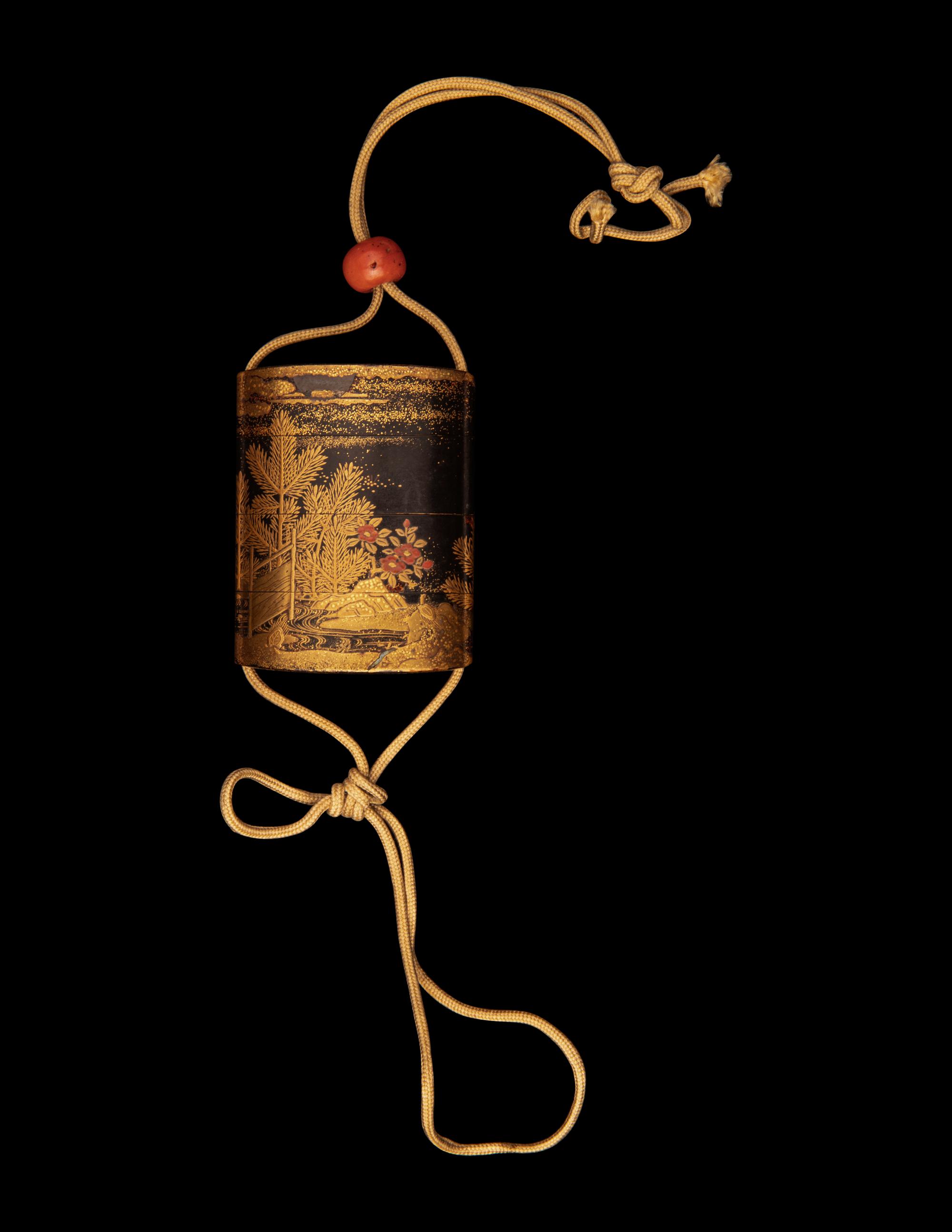 A Japanese Gold and Black Lacquer Three-Case Inro