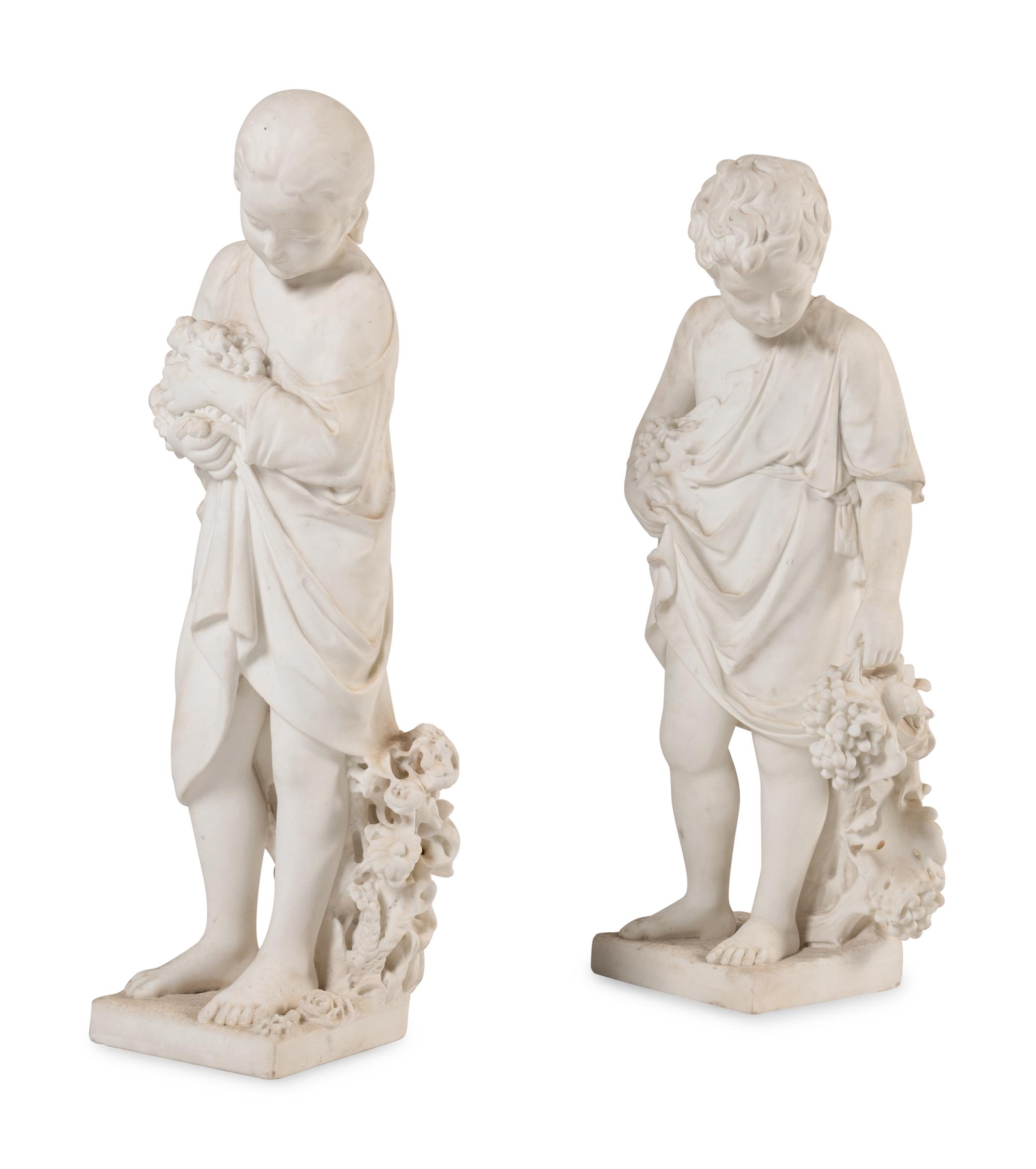 A Pair of Italian Carved Marble Figures of a Boy and Girl