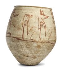An Egyptian-Style Polychrome Canopic Jar
