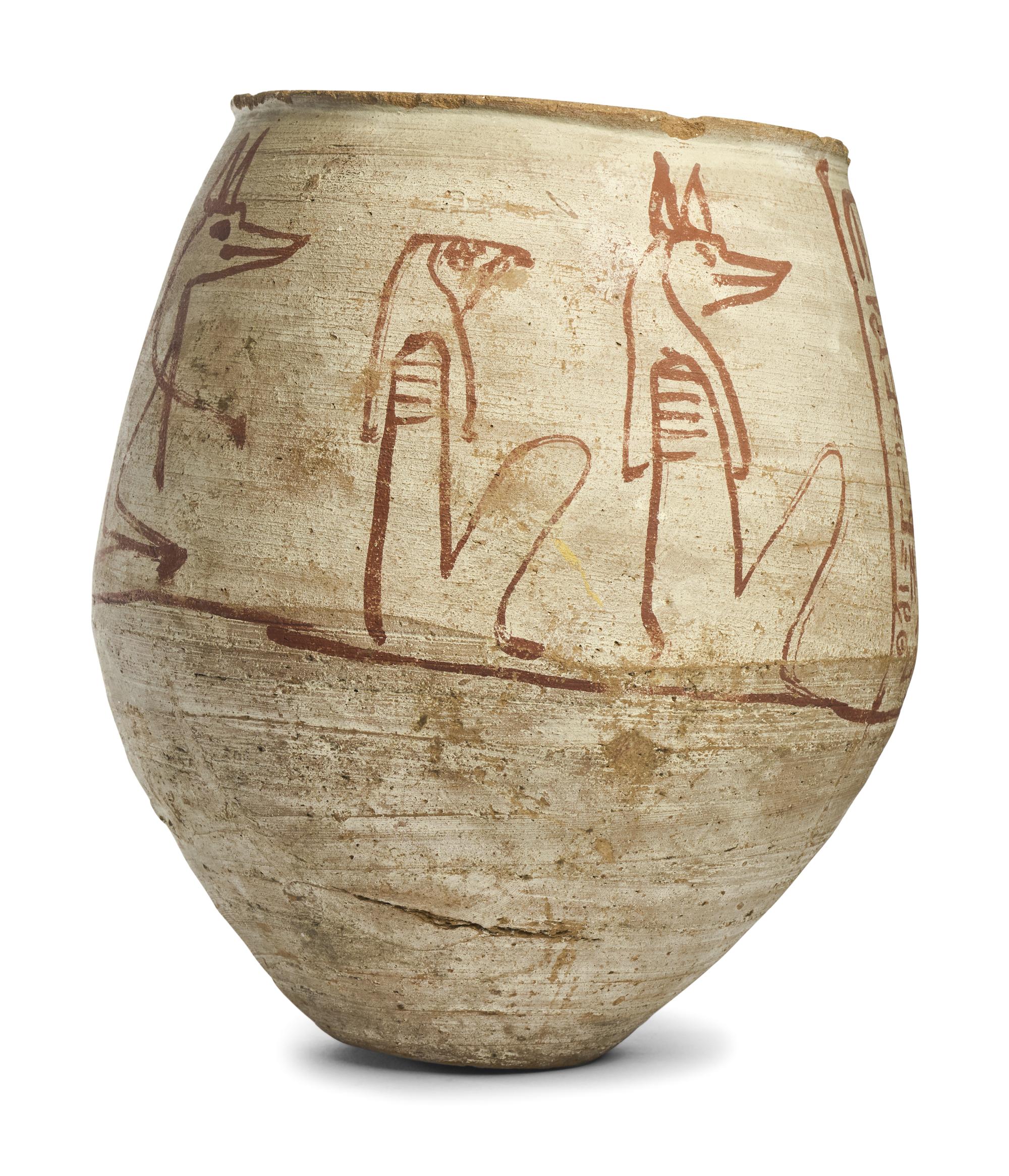 An Egyptian-Style Polychrome Canopic Jar
