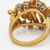 An 18K Yellow Gold and Diamond Wave Ring French