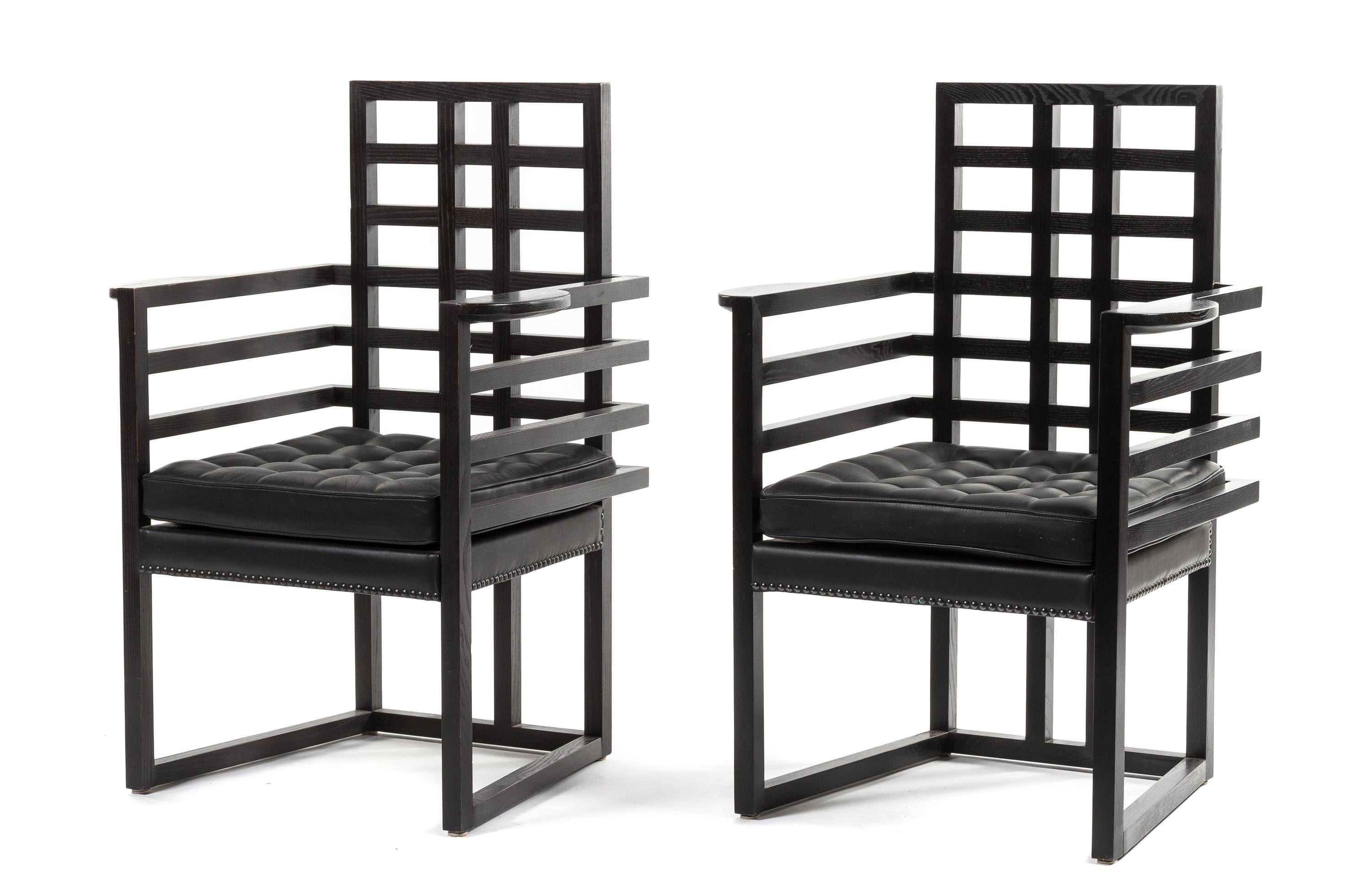 A Matched Pair of Josef Hoffmann for Wittmann Ebonized Wood Arm Chairs Height 38 x width 26 x depth 20 inches.