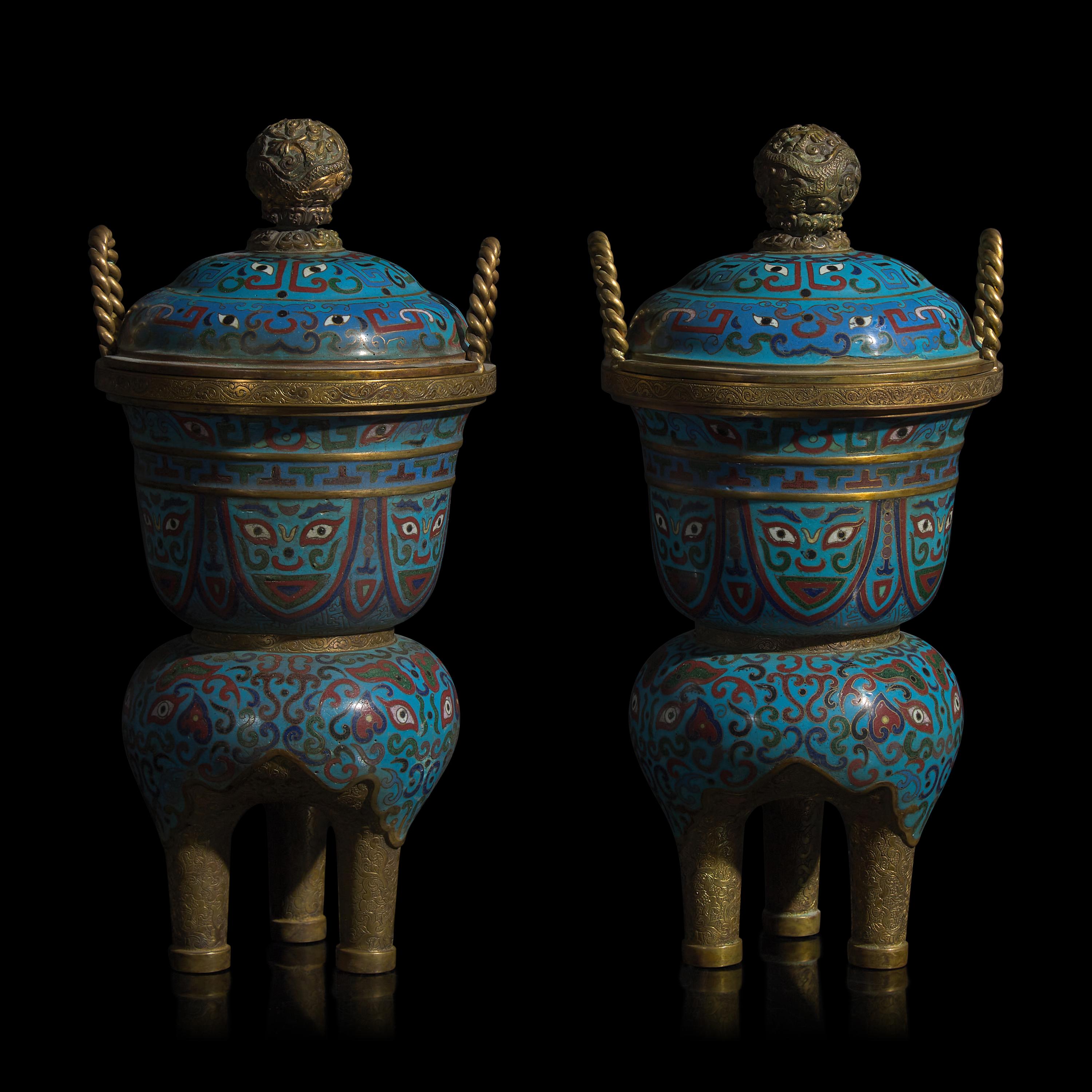 A Pair of Chinese Cloisonné Covered Tripod Vessels, 20th Century 近代 掐絲琺瑯仿古三足爐一對