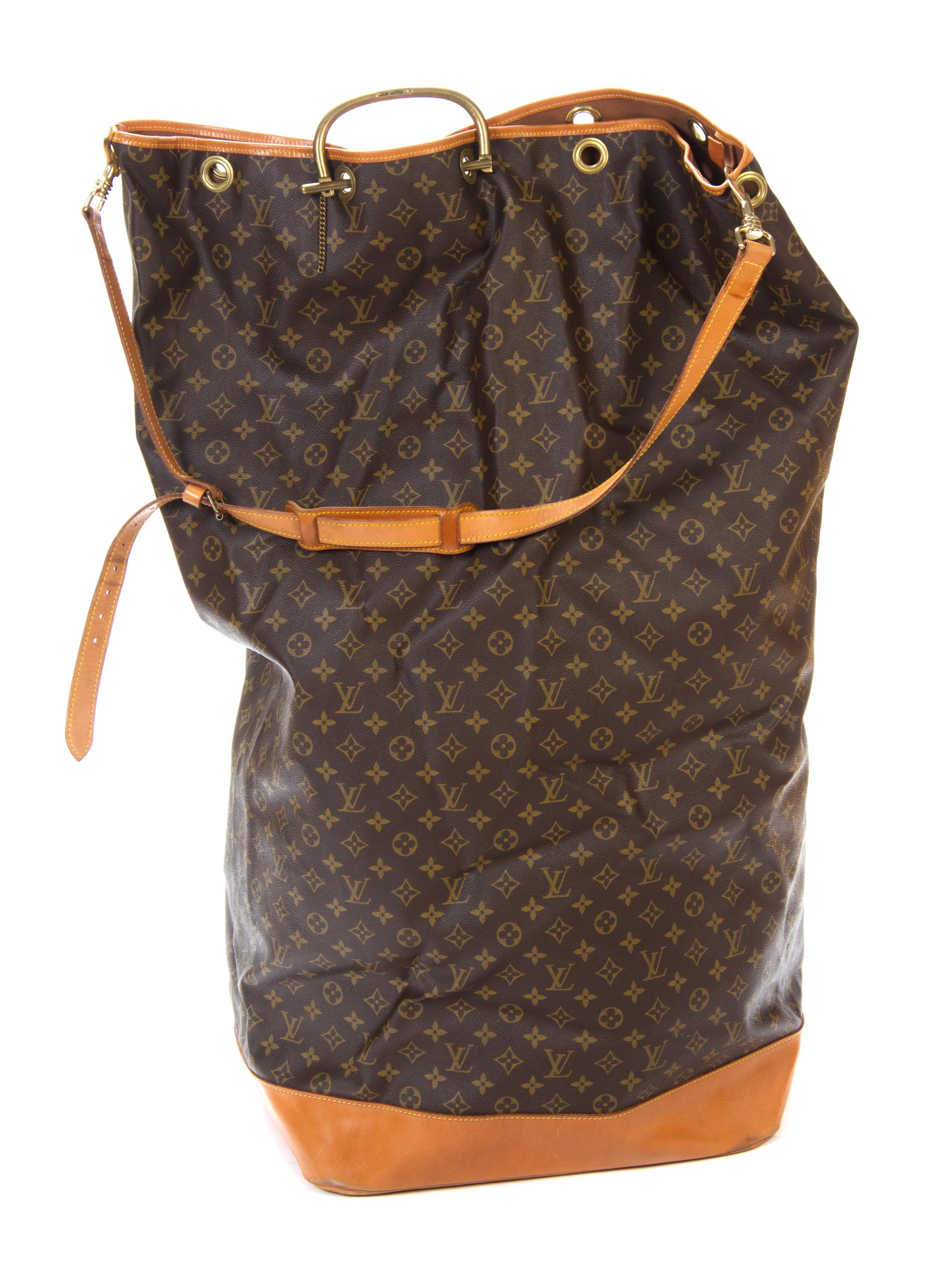 A Louis Vuitton Vintage Monogram Canvas Laundry Bag, 35 x 15 1/2 x 10 inches.