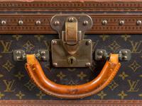 A Louis Vuitton Monogram Canvas Hardside Suitcase. — 20TH CENTURY