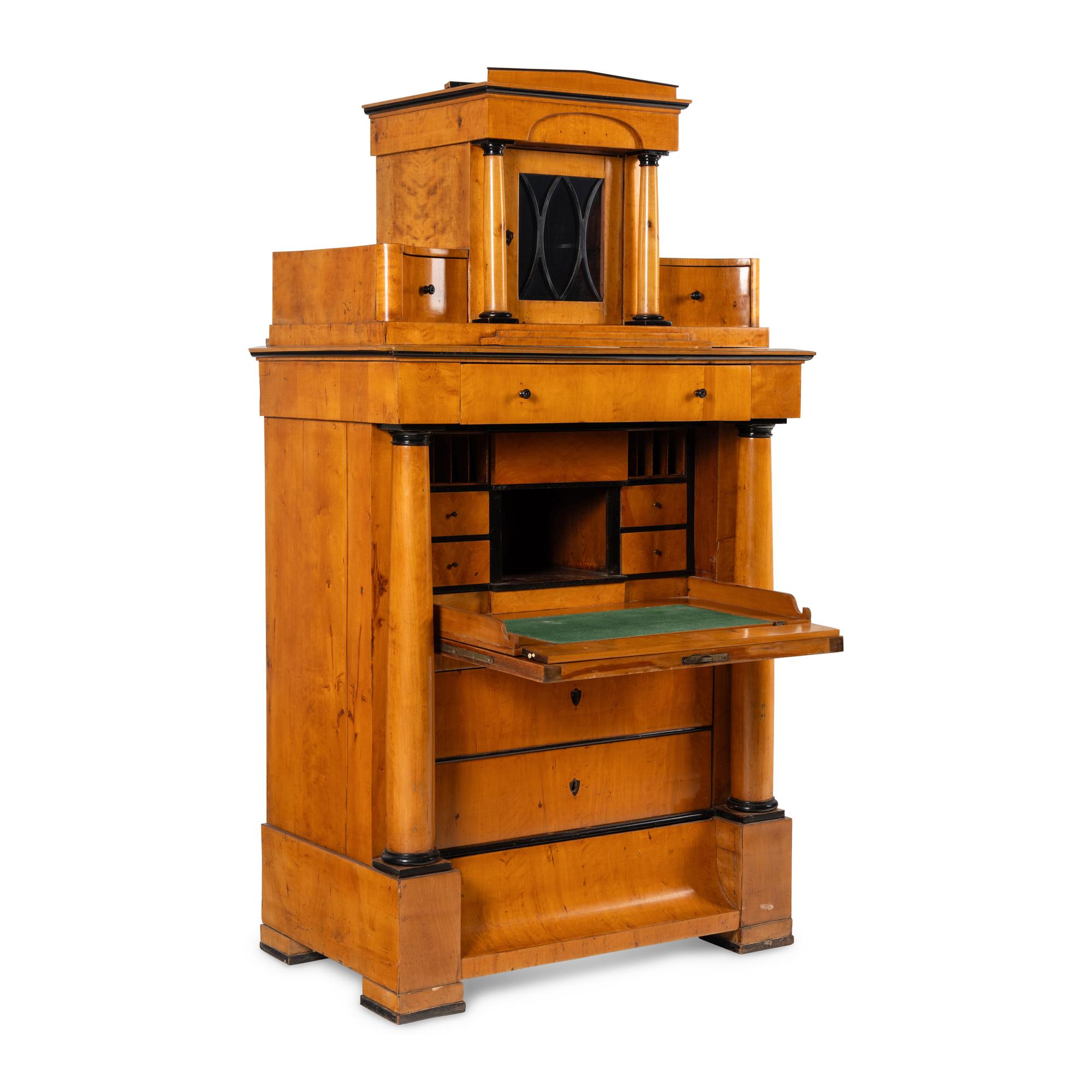 A Biedermeier Part-Ebonized Birch Bureau Cabinet