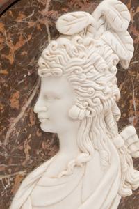 A Set of Four Iron-Framed Carved Marble Portrait Plaques of English Figures