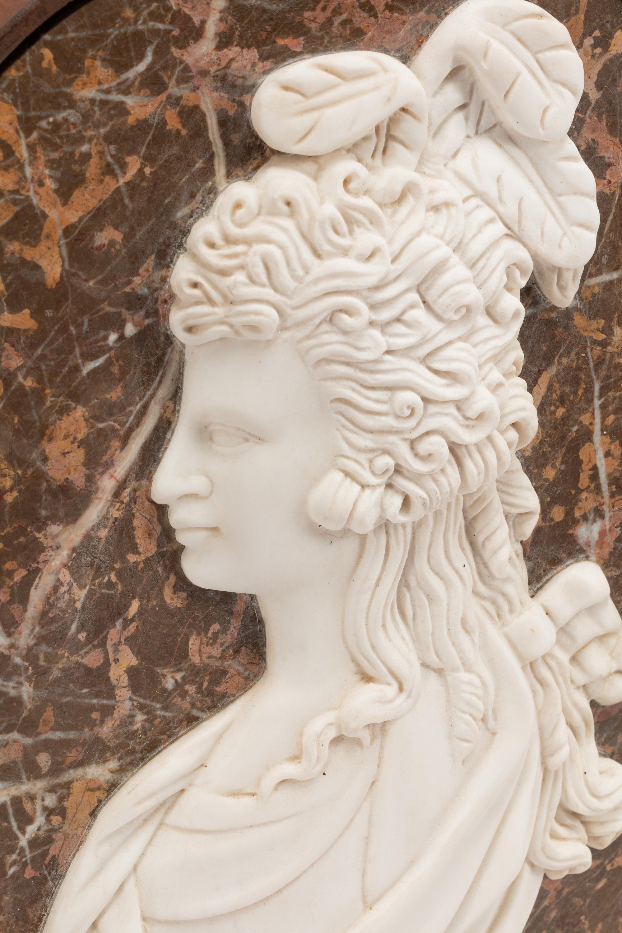 A Set of Four Iron-Framed Carved Marble Portrait Plaques of English Figures