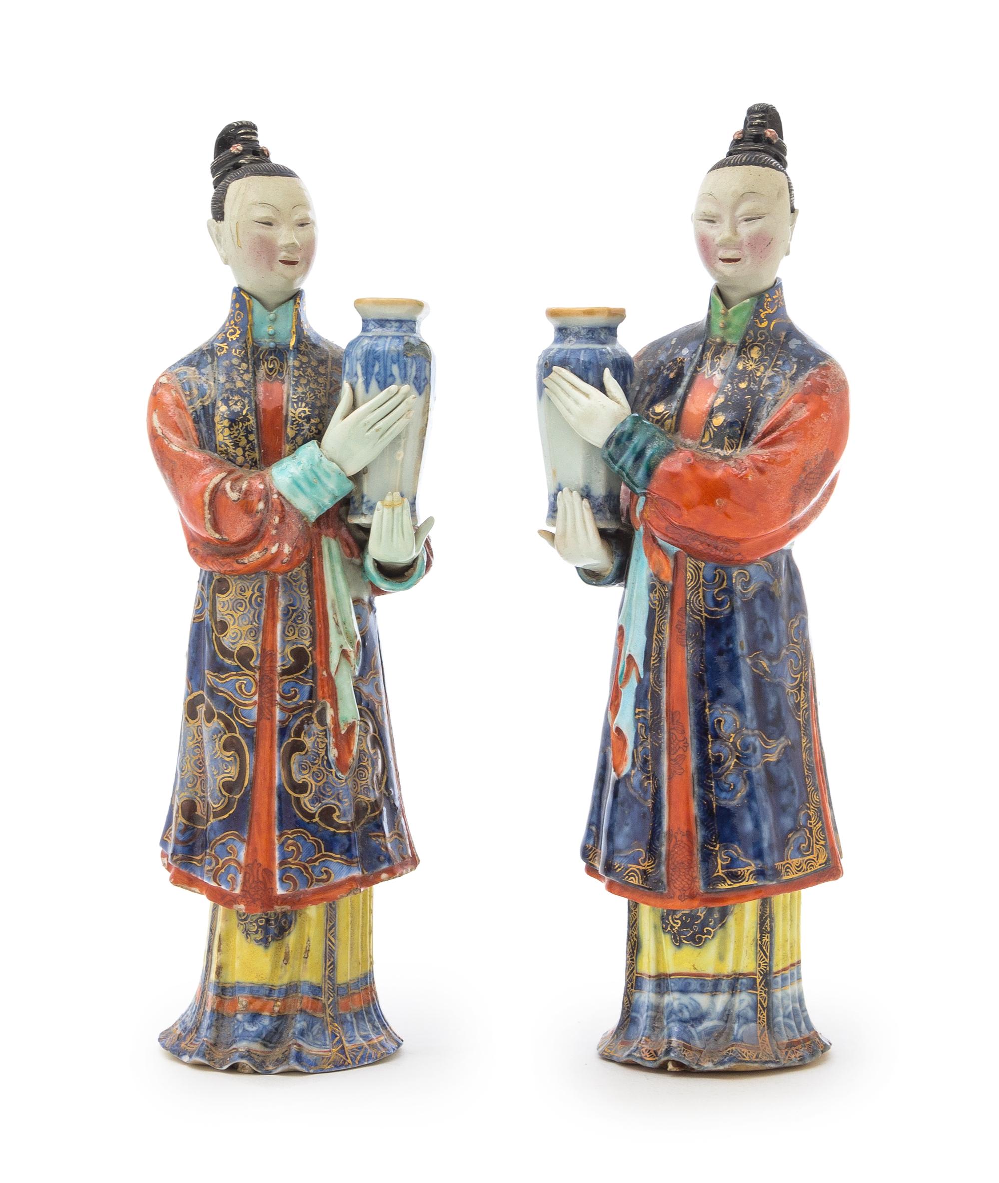A Pair of Chinese Export Polychrome Enameled Porcelain Figures of Court Ladies Height of each 10 inches. — LATE QING DYNASTY