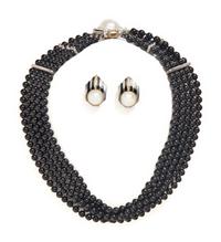 CARTIER, STERLING SILVER, YELLOW GOLD, CULTURED PEARL AND ONYX JEWELRY SUITE