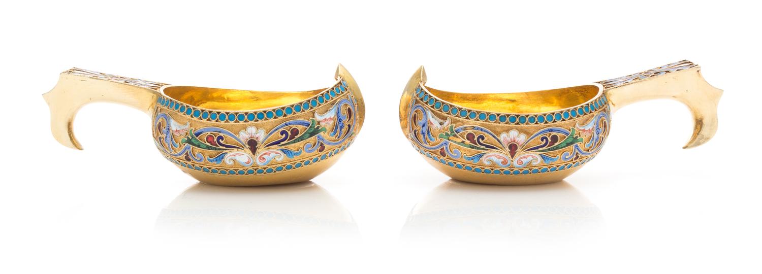 A Pair of Russian Silver-Gilt and Enameled Kovshi, Mark of Nikolay Strulev, Moscow, 20th Century, each of typical form, the body and ha