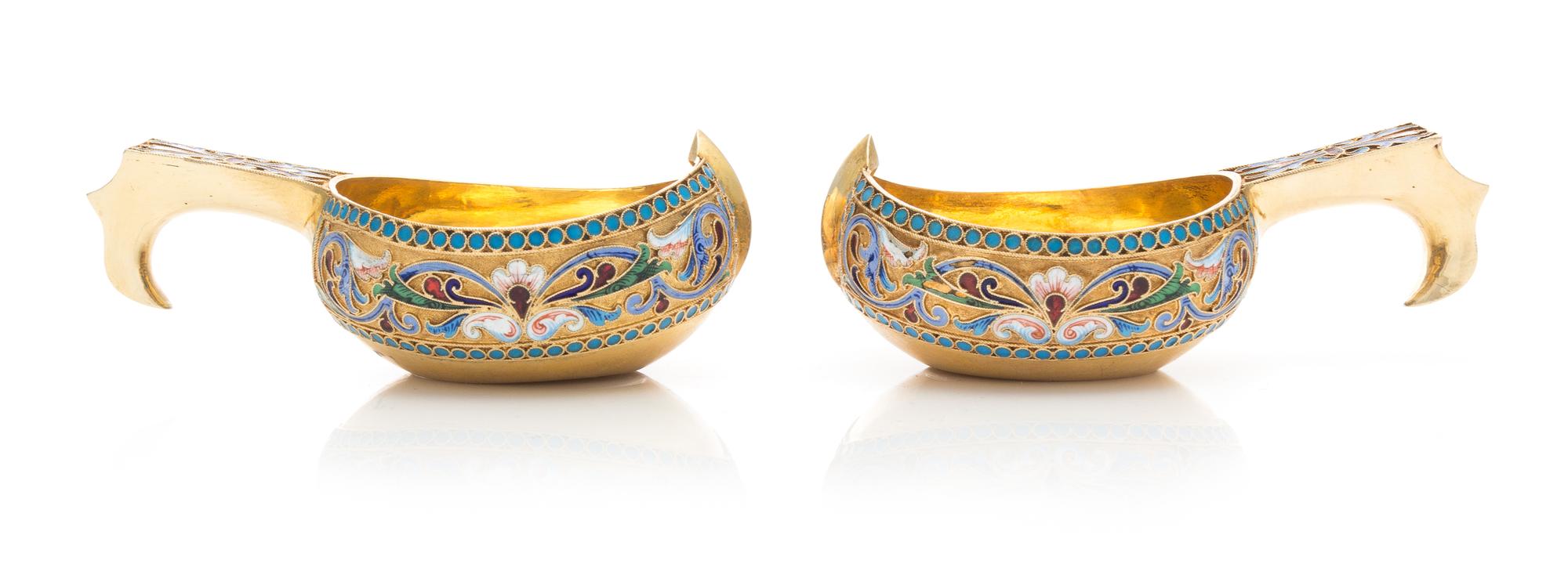 A Pair of Russian Silver-Gilt and Enameled Kovshi, Mark of Nikolay Strulev, Moscow, 20th Century, each of typical form, the body and ha