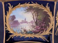 A Sèvres Style Painted and Parcel Gilt Porcelain Table Casket