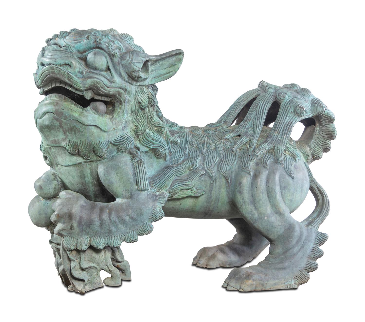 A Pair of Patinated Bronze Buddhistic Lions