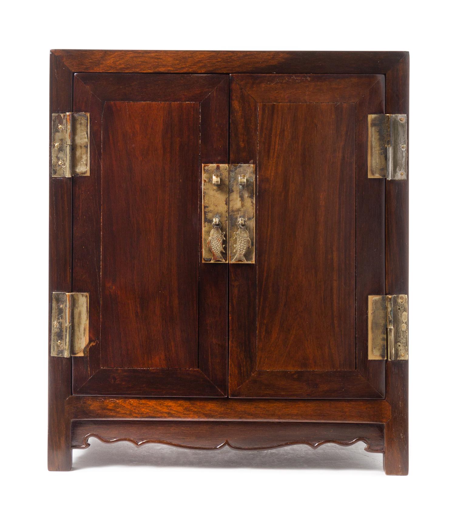 A Chinese Zitan Kang Cabinet, Antougui Height 13 3/4 x width 11 5/8 x depth 6 3/4 inches. — 18TH/19TH CENTURY