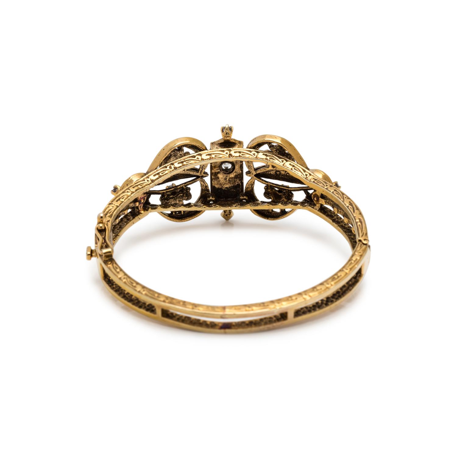 YELLOW GOLD, DIAMOND, SEED PEARL AND ENAMEL BANGLE BRACELET