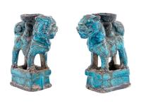 A Pair of Chinese Turquoise Glazed Pottery Fu Lion-Form Candle Holders
