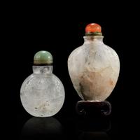 Two Chinese carved quartz snuff bottles