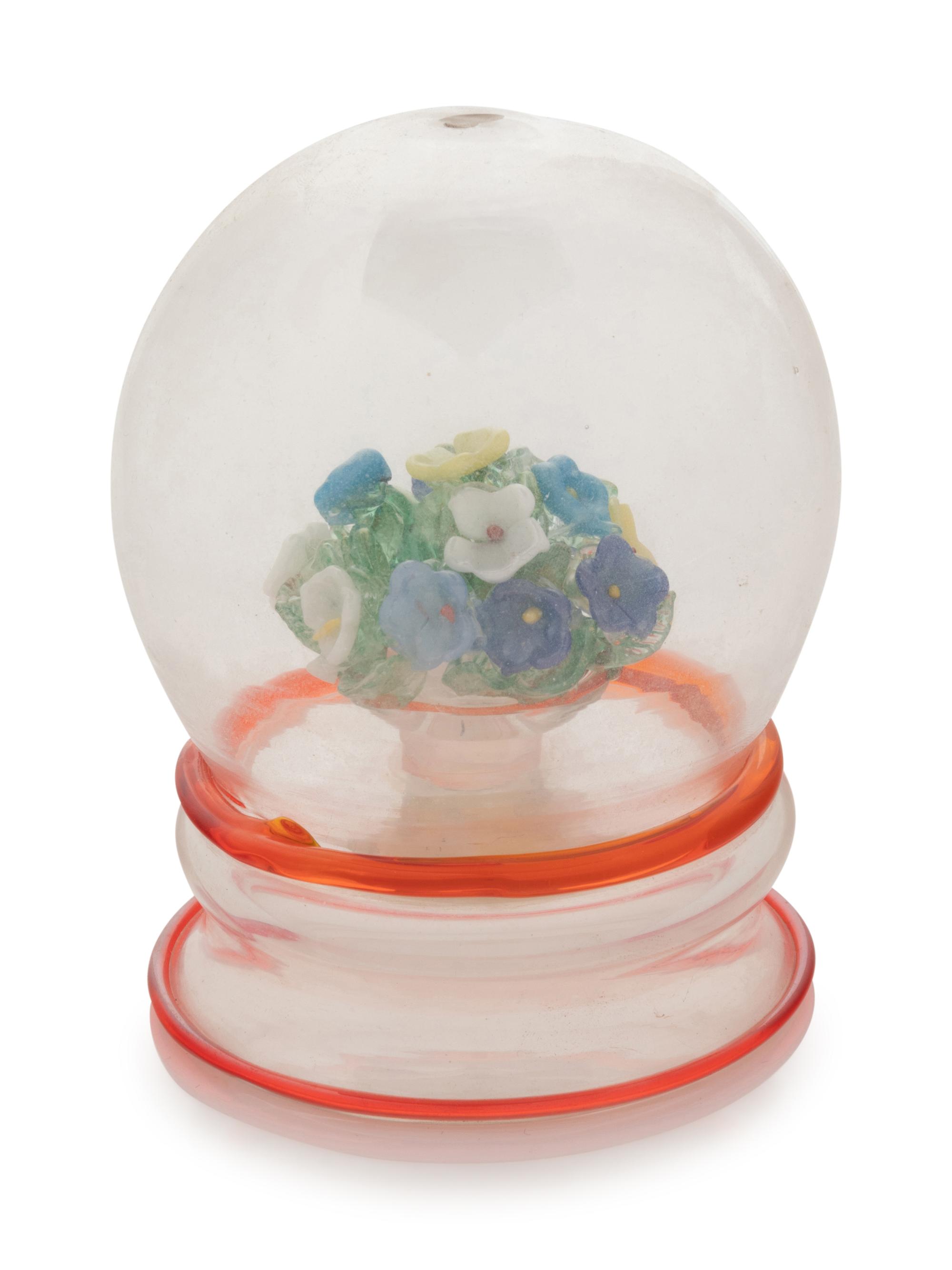 A Flower Bouquet Globe Form Blown Glass Paperweight