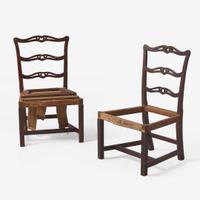 A pair of Chippendale carved mahogany ribbon-back side chairs, Probably Massachusetts, circa 1790-1800