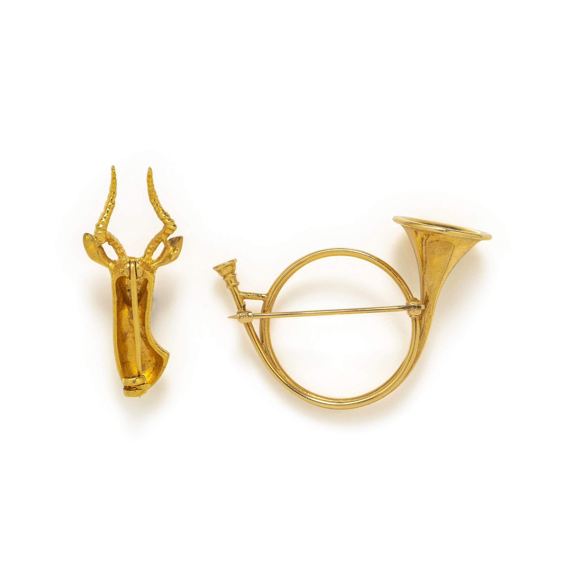 COLLECTION OF YELLOW GOLD BROOCHES