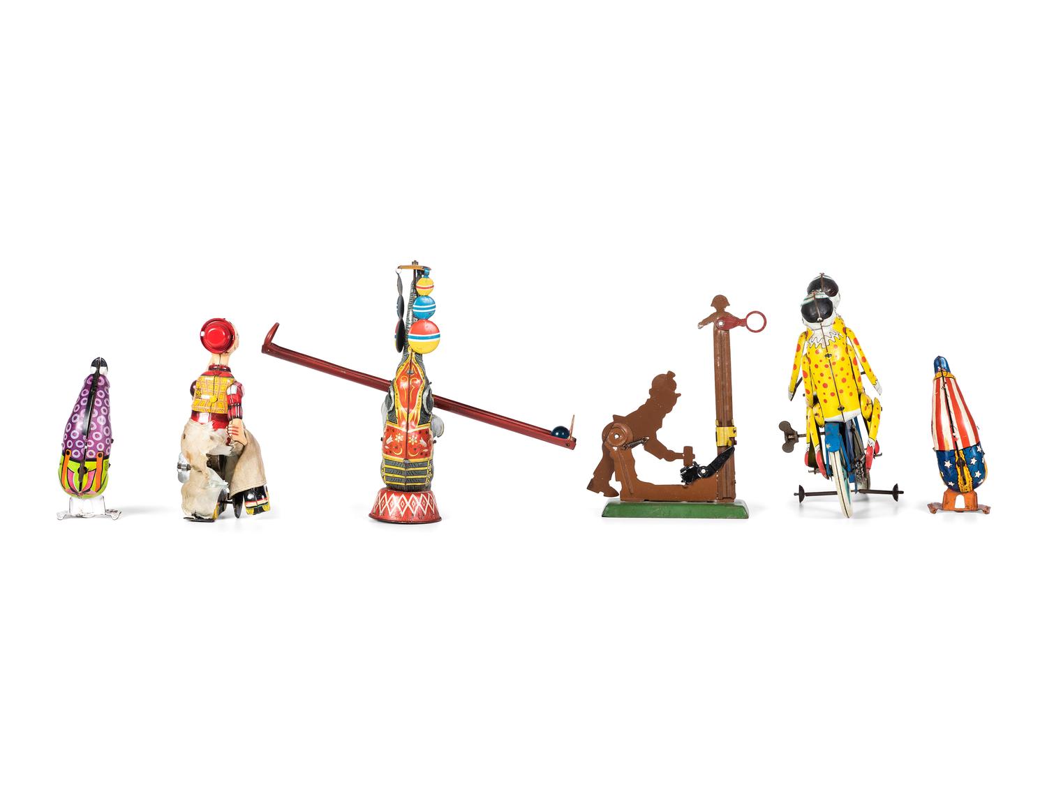 Six Tin Clown and Circus Toys
