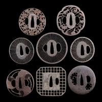 A group of eight Japanese pierced iron and metal tsuba 刀镡一组八件 Edo period ??