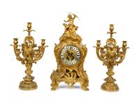 A Louis XV Style Gilt Bronze Clock Garniture