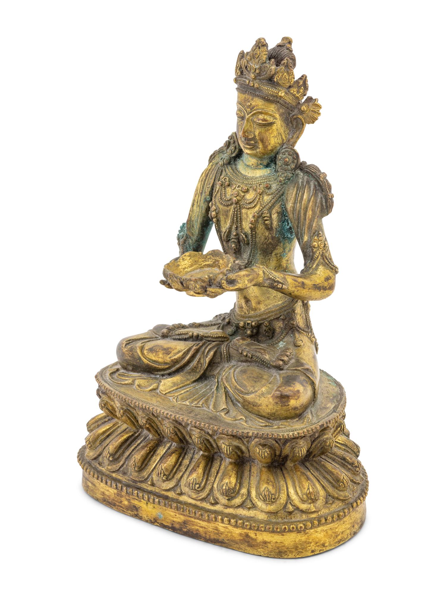 An Unusual Gilt Bronze Figure of Seated Maitreya