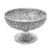 An American Silver Center Bowl, S. Kirk & Son, Baltimore, MD, worked to show floral and foliate repousse decoration, centered with an e