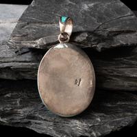 Michael Perry (Diné, b. 1972) — Sterling Silver and Kingman Turquoise Pendant