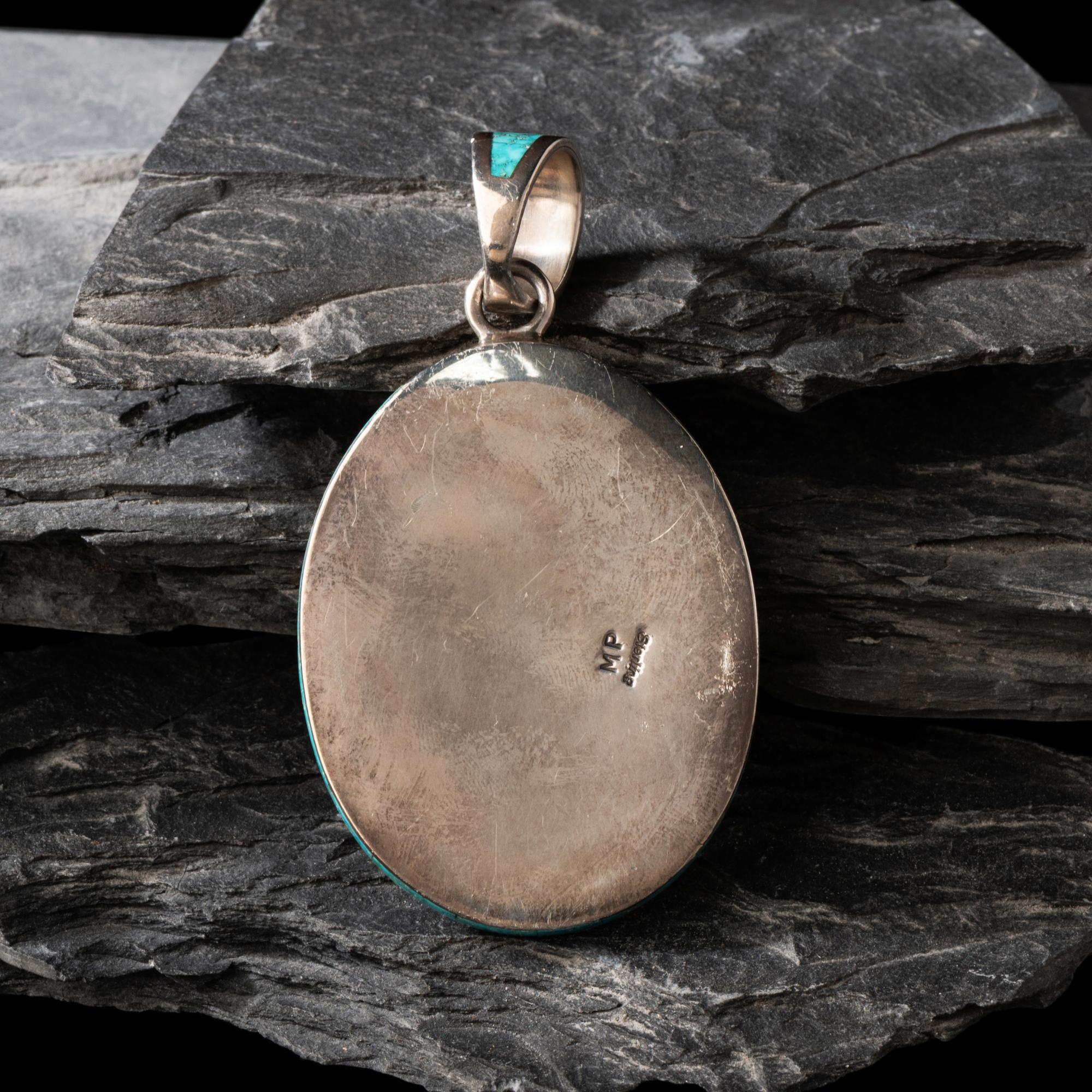 Michael Perry (Diné, b. 1972) — Sterling Silver and Kingman Turquoise Pendant