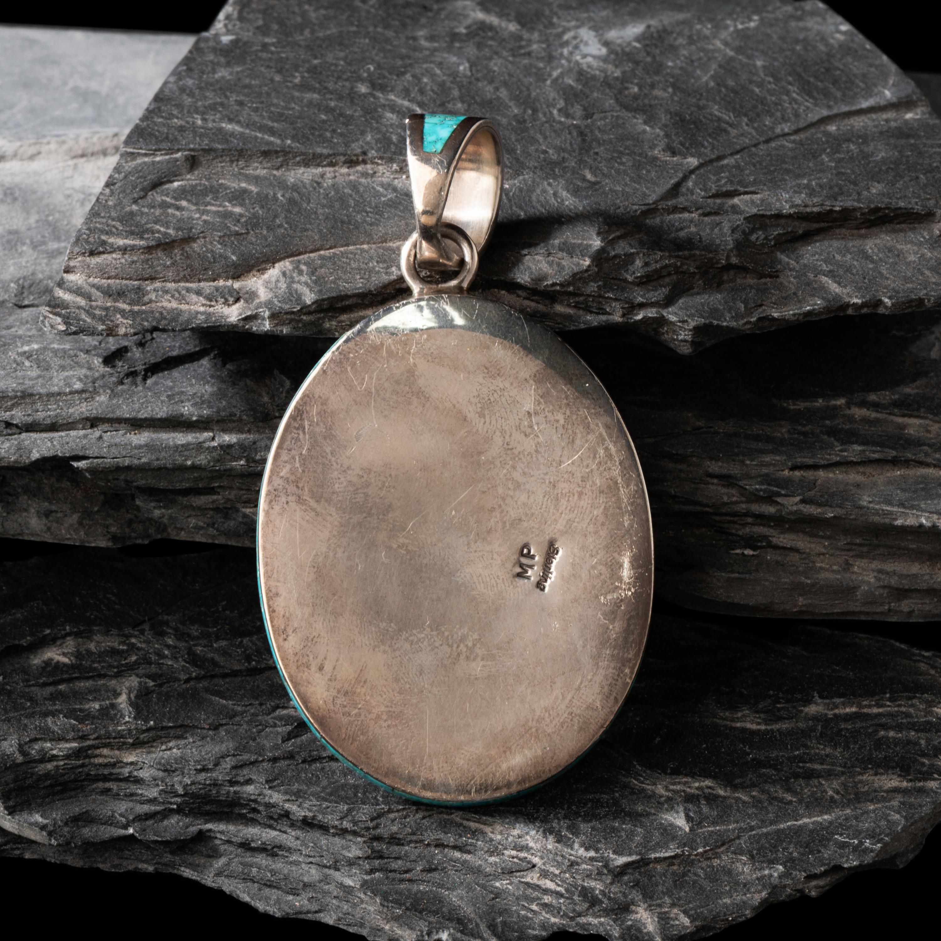 Michael Perry (Diné, b. 1972) — Sterling Silver and Kingman Turquoise Pendant