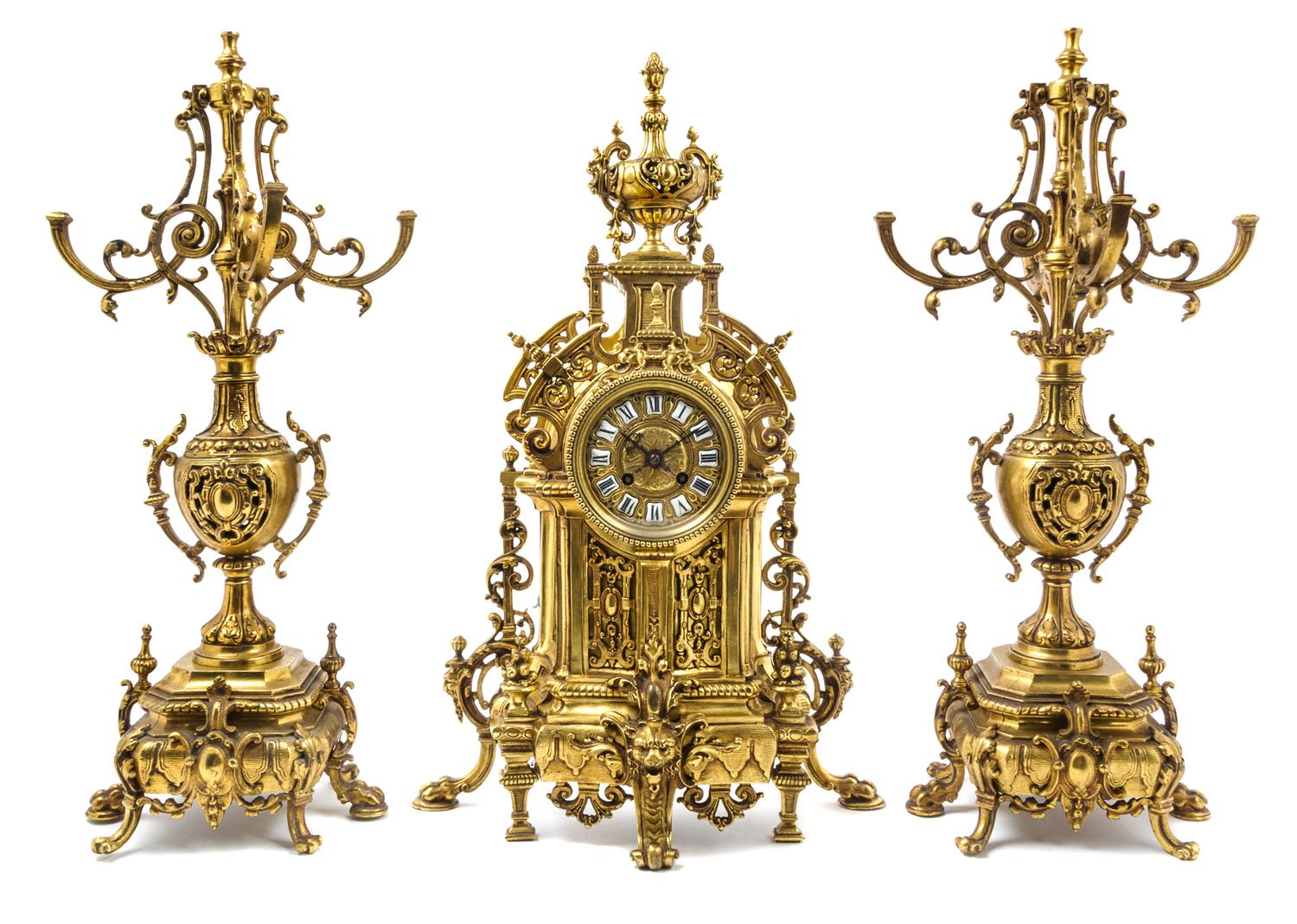 A French Gilt Brass Clock Garniture Height of clock 22 1/2 inches. — MOVEMENT BY JAPY FRERES, 19TH/20TH CENTURY