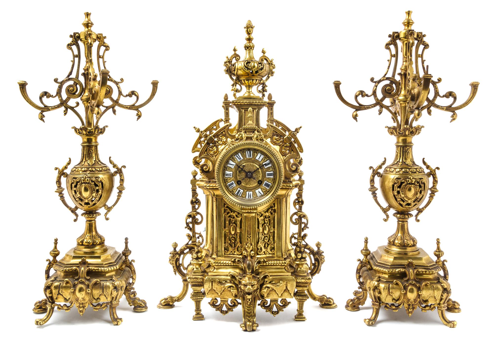 A French Gilt Brass Clock Garniture Height of clock 22 1/2 inches. — MOVEMENT BY JAPY FRERES, 19TH/20TH CENTURY