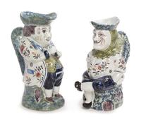 A Pair of French Pottery Figural Jugs Height of taller 11 1/4 inches.