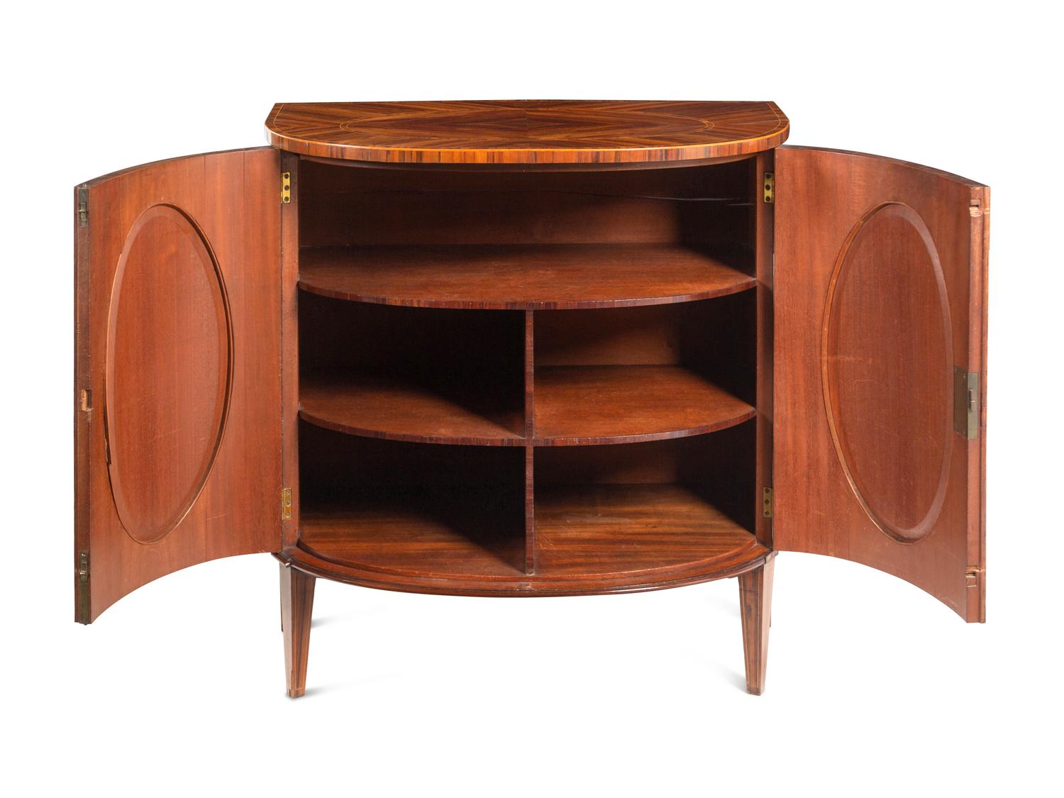 A Pair of George III Goncalo Alves Demilune Cabinets
