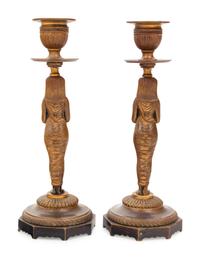 A Pair of Egyptian Revival Bronze Figural Candlesticks