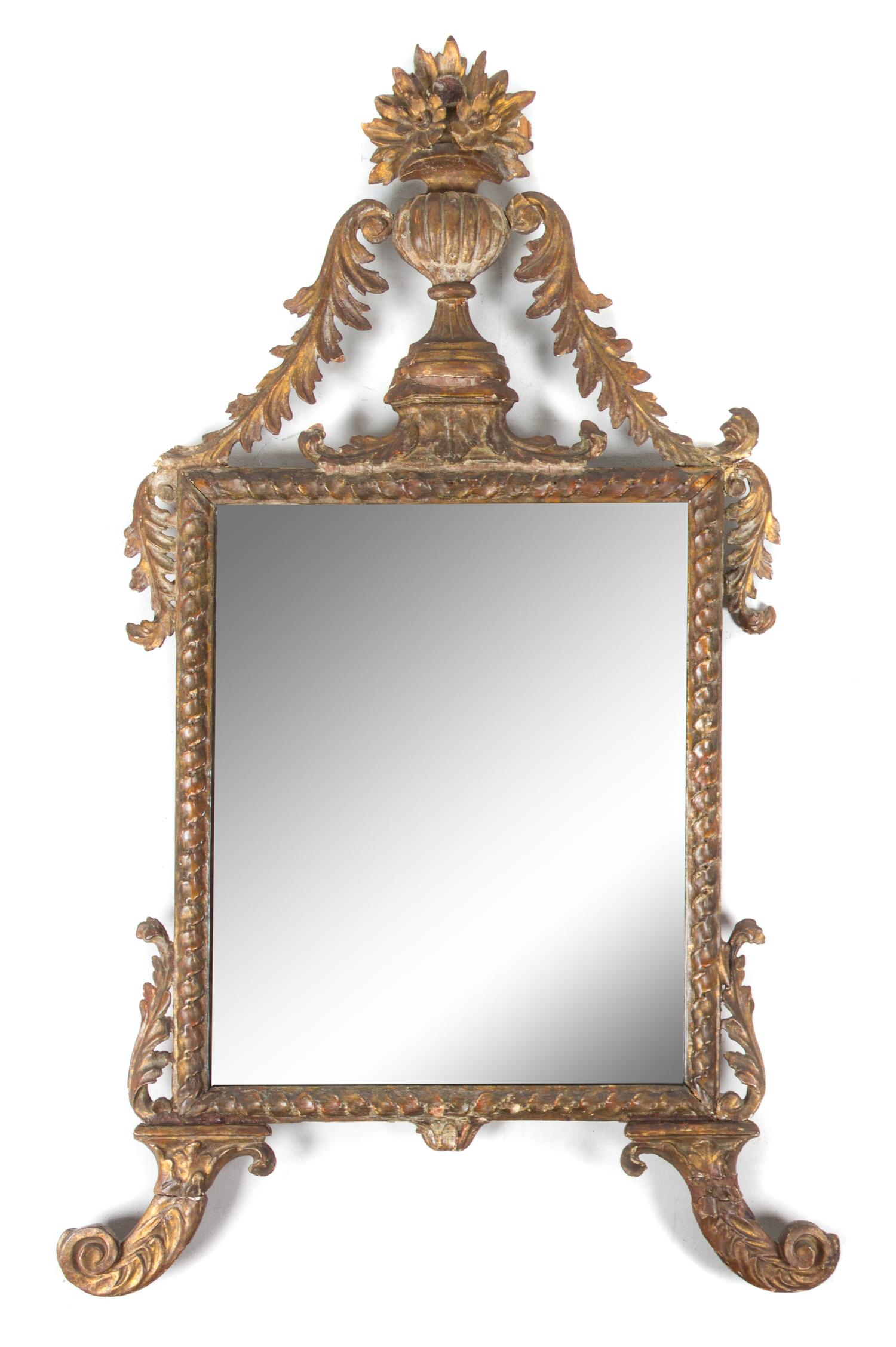 An Italian Giltwood Mirror Height 48 x width 29 inches. — 18TH CENTURY